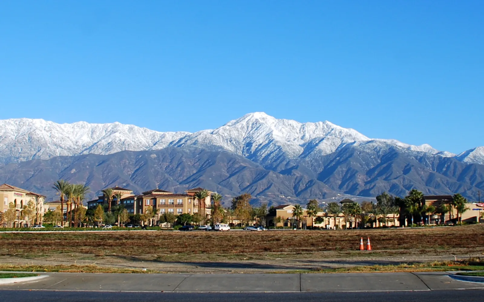 Cucamonga Peak rises in the San Gabriel Mountains, showing the dramatic landscape that defines the foothill region of the Pomona Valley.